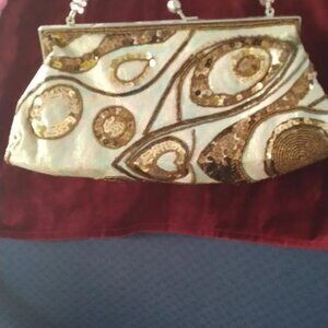 Evening clutch. Covered with bronze, gold metallic sequins. Perfect Compliment